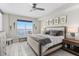 Serene bedroom featuring a comfortable bed, water views, and elegant decor for a peaceful retreat at 1325 Snell Isle Ne Blvd # 708, St Petersburg, FL 33704