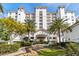 Elegant building exterior boasting manicured landscaping, water feature, and a grand entrance, exuding luxury and sophistication at 1325 Snell Isle Ne Blvd # 708, St Petersburg, FL 33704