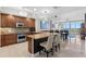 Open kitchen with granite countertops, stainless steel appliances, and a breakfast bar with seating at 1325 Snell Isle Ne Blvd # 708, St Petersburg, FL 33704