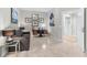 Cozy seating area or office space featuring neutral tones and a view towards the hallway and elevator at 1325 Snell Isle Ne Blvd # 708, St Petersburg, FL 33704
