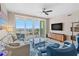 Bright living room boasts expansive waterfront views, modern furnishings, and a neutral color palette at 1325 Snell Isle Ne Blvd # 708, St Petersburg, FL 33704