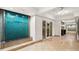 Elegant lobby featuring a decorative water feature, tiled floors, and a welcoming entrance at 1325 Snell Isle Ne Blvd # 708, St Petersburg, FL 33704