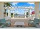 Charming waterfront patio with comfortable outdoor furniture and scenic views, perfect for relaxation at 1325 Snell Isle Ne Blvd # 708, St Petersburg, FL 33704