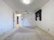 Standard bedroom with closet, carpet flooring, and neutral colored walls at 13725 Oak Forest N Blvd, Seminole, FL 33776