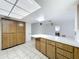 Bright kitchen with skylight, breakfast bar, and plenty of cabinet space at 13725 Oak Forest N Blvd, Seminole, FL 33776
