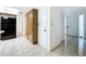 Cozy kitchen with tile floors and a black refrigerator at 13725 Oak Forest N Blvd, Seminole, FL 33776