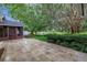 Spacious backyard with a paver patio and view of the pond, ideal for outdoor relaxation and entertaining at 13898 Egret Ln, Clearwater, FL 33762