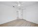 Bedroom featuring luxury vinyl floors, ceiling fan, and lots of natural light at 13898 Egret Ln, Clearwater, FL 33762