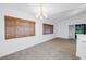 Dining room with chandelier, tile floors, and natural light at 13898 Egret Ln, Clearwater, FL 33762