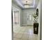 Elegant foyer with decorative furnishings and plenty of natural light at 14015 Arbor Pines Dr, Riverview, FL 33579