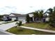 Attractive home with mature landscaping and a lush green lawn at 14015 Arbor Pines Dr, Riverview, FL 33579