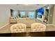 Open-concept living room featuring neutral tones and lots of natural light at 14015 Arbor Pines Dr, Riverview, FL 33579