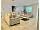 Bright living room with neutral furnishings and lots of natural light at 14015 Arbor Pines Dr, Riverview, FL 33579