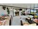 Enclosed patio with dining and lounge areas at 14015 Arbor Pines Dr, Riverview, FL 33579