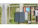 Aerial view showcasing backyard swimming pool, fenced yard, and surrounding neighborhood at 16023 Splitlog Dr, Tampa, FL 33618