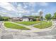 Exterior front view of a single story home with a grassy yard at 16023 Splitlog Dr, Tampa, FL 33618