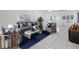 Bright living room featuring stylish furniture, tile floors, and neutral decor at 16023 Splitlog Dr, Tampa, FL 33618