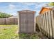 Exterior shot of a backyard storage shed at 16023 Splitlog Dr, Tampa, FL 33618