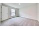 Cozy bedroom featuring carpet floors, large window, and ample space to personalize at 16503 66Th E Ln, Parrish, FL 34219
