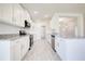 Well-equipped kitchen with granite countertops and stainless steel appliances at 16503 66Th E Ln, Parrish, FL 34219