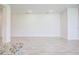 Spacious living room featuring tile flooring and plenty of natural light, perfect for entertaining guests at 16503 66Th E Ln, Parrish, FL 34219
