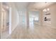 Bright and airy living room with tile flooring and an open layout at 16503 66Th E Ln, Parrish, FL 34219