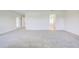 Spacious main bedroom with carpet and ensuite bathroom for optimal comfort and convenience at 16503 66Th E Ln, Parrish, FL 34219