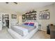 Unique bedroom with sports-themed decor and a view of the closet at 1676 Arabian Ln, Palm Harbor, FL 34685