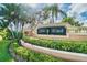 Attractive Boo Ranch entrance sign with manicured landscaping at 1676 Arabian Ln, Palm Harbor, FL 34685