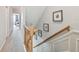 Hallway with stairway to second floor at 1676 Arabian Ln, Palm Harbor, FL 34685