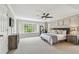 Spacious main bedroom with abundant natural light and neutral tones at 1676 Arabian Ln, Palm Harbor, FL 34685