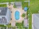 Aerial view showcasing the pool, pergola, and manicured landscaping of this beautiful property at 1807 Split Fork Dr, Oldsmar, FL 34677