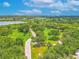 Aerial view of the park with walking trails surrounded by green space and waterways at 1807 Split Fork Dr, Oldsmar, FL 34677