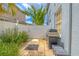 Backyard area featuring a grill, perfect for outdoor cooking and entertainment at 1807 Split Fork Dr, Oldsmar, FL 34677