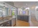 Kitchen featuring stainless steel appliances, granite countertops, and an island with breakfast bar at 1807 Split Fork Dr, Oldsmar, FL 34677