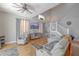 Bright living room with comfortable seating, tall ceilings, large windows, and stylish decor at 1807 Split Fork Dr, Oldsmar, FL 34677