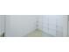 Walk-in closet with adjustable shelving at 1838 Eagle Ridge Blvd, Palm Harbor, FL 34685