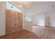 Bright foyer featuring a double door entry, high ceilings, and wood-look flooring at 1838 Eagle Ridge Blvd, Palm Harbor, FL 34685