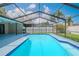 Screened-in pool in backyard provides the perfect area to relax or entertain friends and Gathering at 1838 Eagle Ridge Blvd, Palm Harbor, FL 34685