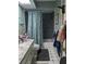 Bathroom with shower, sink, and toilet, exhibiting unique tilework and decor, needs updating at 18804 Tournament Trl, Tampa, FL 33647