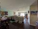 Spacious living room featuring hardwood floors, and ample natural light at 18804 Tournament Trl, Tampa, FL 33647