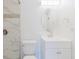 Bathroom with a white vanity, decorative mirror, and a tiled shower at 1974 Hidden Springs Pl, Clearwater, FL 33760