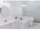 Elegant bathroom featuring a soaking tub, glass shower, and stylish fixtures at 1974 Hidden Springs Pl, Clearwater, FL 33760