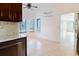 Bright eat-in kitchen with a window and marble countertops at 1974 Hidden Springs Pl, Clearwater, FL 33760