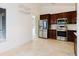 The kitchen features stainless steel appliances and plenty of cabinet space at 1974 Hidden Springs Pl, Clearwater, FL 33760