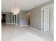 Spacious living area with tile flooring and open access to other parts of the home at 1974 Hidden Springs Pl, Clearwater, FL 33760