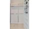Well-organized walk-in closet with multiple storage solutions at 1974 Hidden Springs Pl, Clearwater, FL 33760