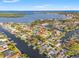 Waterfront neighborhood aerial view showcases the home's proximity to water at 2006 Tanglewood Ne Dr, St Petersburg, FL 33702