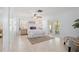 Bright bedroom with neutral decor and French doors leading to the outside at 2006 Tanglewood Ne Dr, St Petersburg, FL 33702