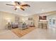 Bright living room with stylish furniture and an adjacent kitchen at 2006 Tanglewood Ne Dr, St Petersburg, FL 33702